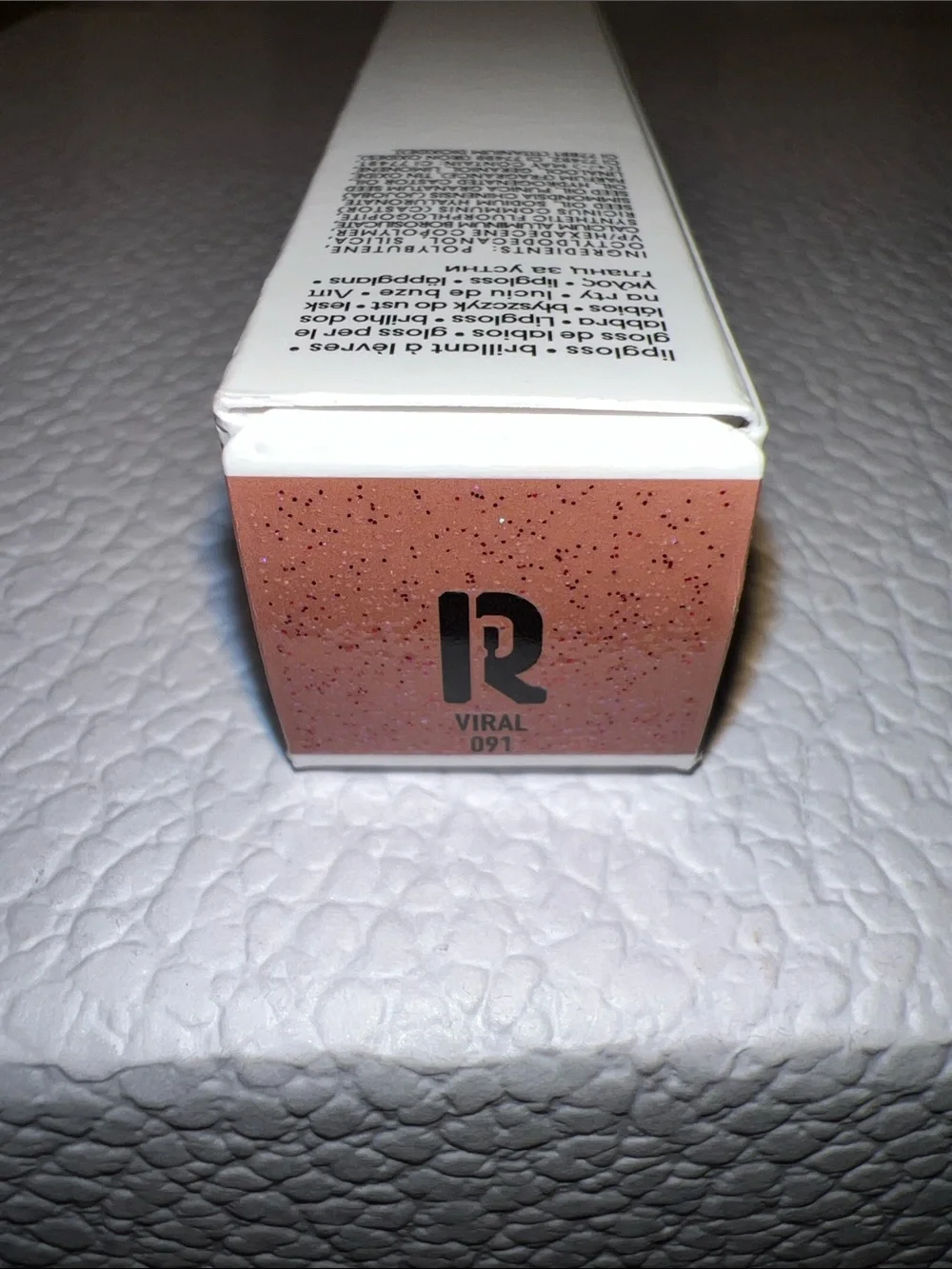 Rabanne Glowies Ultra Shiny non sticky lipgloss with multidimensional pearl 091
